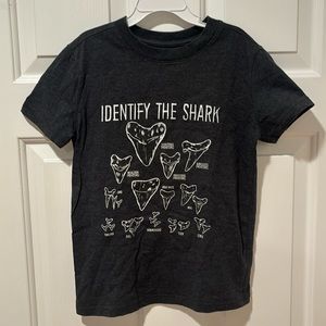 Boys dark gray tshirt size small (6-7) with different shark teeth pictures